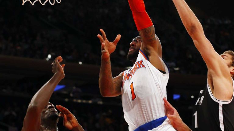 Knicks vs. Nets 17 Amar'e Stoudemire of the New York Knicks puts up a shot for a basket in the first half against the Brooklyn Nets at Madison Square Garden on Tuesday, Dec. 2, 2014.