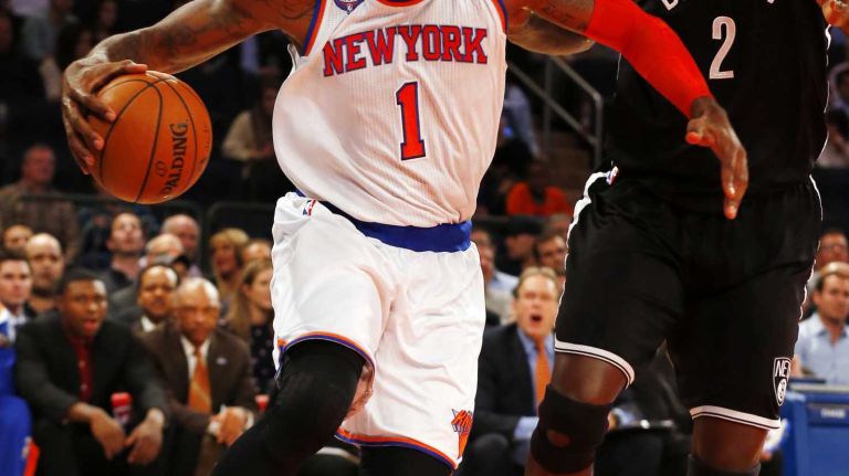 Knicks vs. Nets 18 Amar'e Stoudemire of the New York Knicks drives against Kevin Garnett of the Brooklyn Nets in the first half at Madison Square Garden on Tuesday, Dec. 2, 2014.