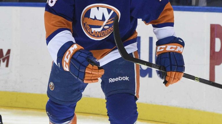 Islanders vs. Senators 30 New York Islanders center Ryan Strome skates after scoring against the Ottawa Senators in the third period of an NHL game at Nassau Coliseum on Tuesday, Dec. 2, 2014.