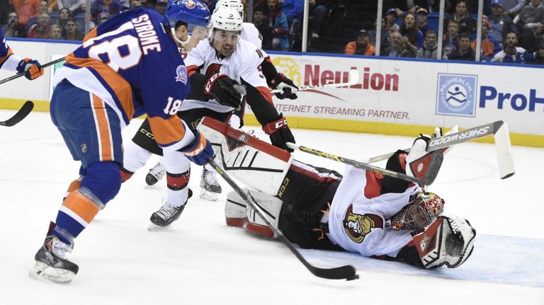 Islanders vs. Senators 48 New York Islanders center Ryan Strome can't get the puck past Ottawa Senators goalie Craig Anderson in the first period of an NHL game at Nassau Coliseum on Tuesday, Dec. 2, 2014.