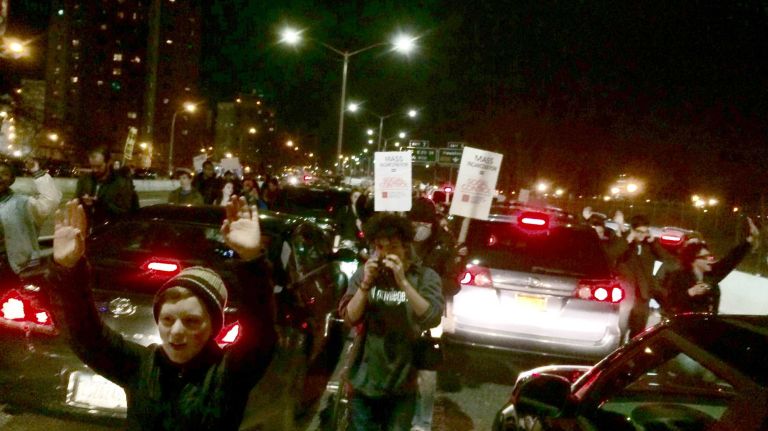 Protesters walk on the FDR Drive south in the northbound lane in Manhattan on Nov. 25, 2014, in response to the grand jury decision in the fatal shooting of Michael Brown.