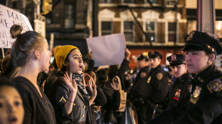 Protesters gather in Lower Manhattan on Tuesday, Nov. 25, 2014, in response to the grand jury decision regarding the fatal shooting of Michael Brown in Ferguson, Mo.