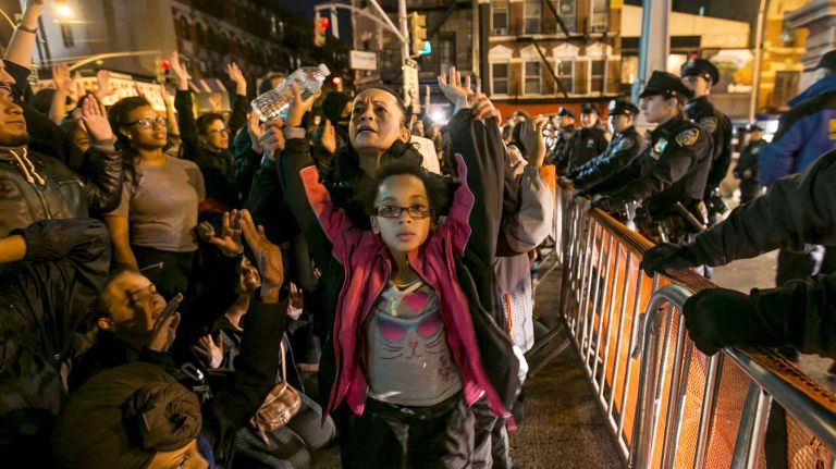 Protesters gather in Lower Manhattan on Tuesday, Nov. 25, 2014, in response to the grand jury decision regarding the fatal shooting of Michael Brown in Ferguson, Mo.