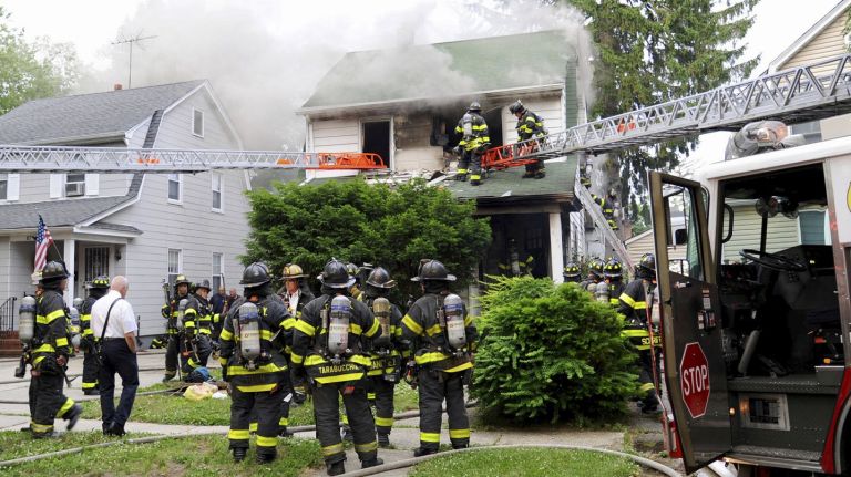 A woman died in a house fire in Bellerose Manor on Monday evening.