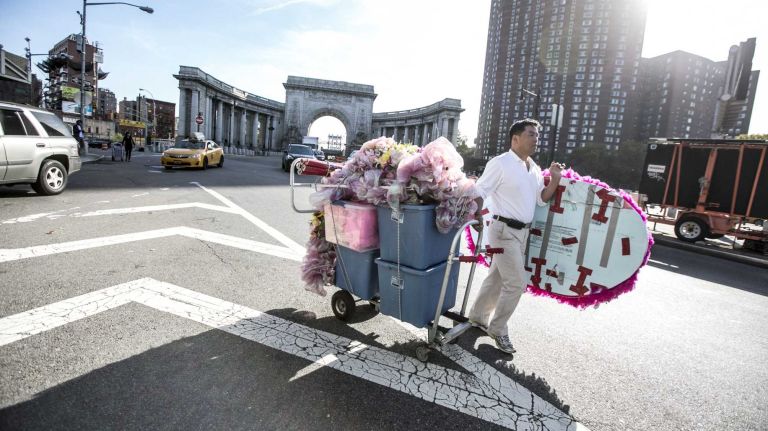 A man walk along canal in Chinatown in Manhattan, on Nov. 4, 2014.