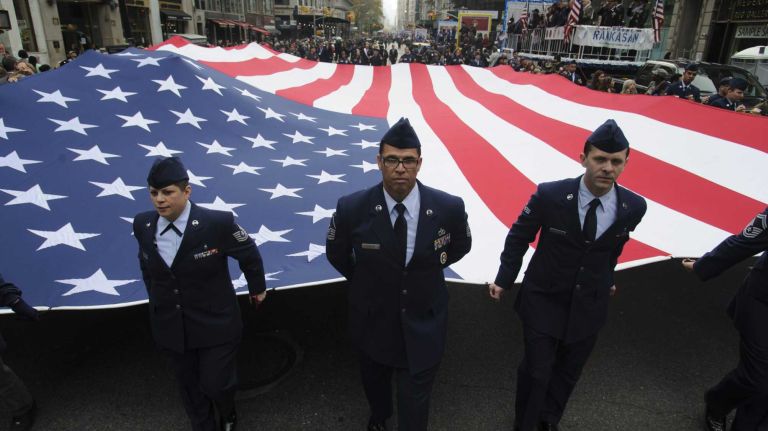 NYC Veterans Day Parade in images 15 Participants march in the 95th annual New York City Veterans Day Parade on Tuesday, November 11, 2014.