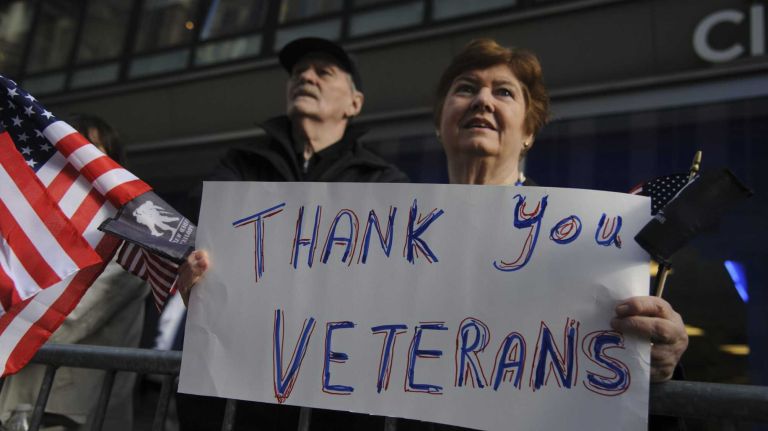NYC Veterans Day Parade in images 21 Parade goers show their support for veterans during the 95th annual New York City Veterans Day Parade on Tuesday, November 11, 2014.