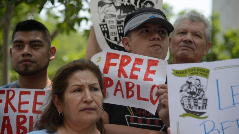 Family of detained deliveryman Pablo Villavicencio rally for his release from ICE detention 2 Supporters of Pablo Villavicencio hold signs of support. Chica and her attorneys submitted a formal release request to ICE on Monday to immediately free her husband, who was detained while delivering a pizza at Fort Hamilton earlier this month.