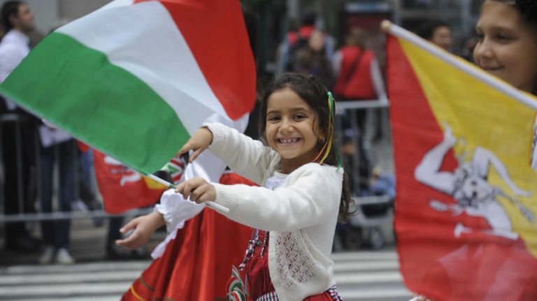 Participants march in the 70th Annual Columbus Day Parade in New York City, Monday, October 13, 2014.The parade is billed as the world's largest celebration of Italian-American heritage and culture.