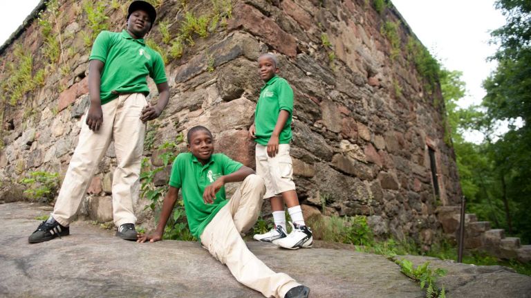 Mame Diba, Max Stvil and Hamsa Sidibe, all 10, like to hang out at Central Park's Blockhouse, which is the highest point in the park and dates to 1814. (May 29, 2012)