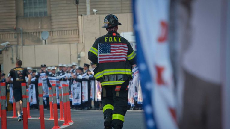 A member of the FDNY exits the Hugh L. Carey Tunnel on Sunday, Sept. 28, 2014, during the 13th Annual Stephen Siller Tunnel to Towers Run that honors fallen 9/11 heroes, 