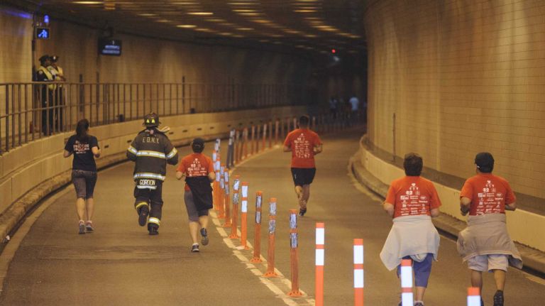 Participants in the 2014 Stephen Siller Tunnel To Towers 5K Run & Walk enter the Brooklyn entrance to the Hugh L. Carey Tunnel on Sunday, Sept. 28, 2014.