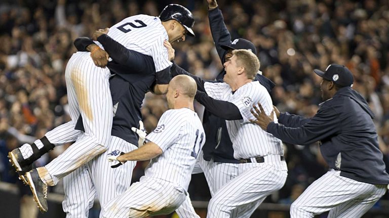 Derek Jeter's final game at Yankee Stadium 94 Yankees' Derek Jeter gets a big hug from CC Sabathia and the team after hitting a ninth-inning, game-winning base hit against the Baltimore Orioles at Yankee Stadium on Thursday, Sept. 25, 2014.