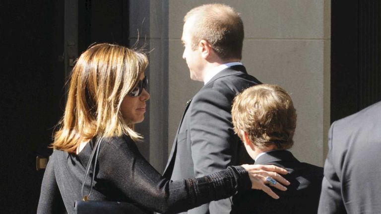 Joan Rivers' daughter, Melissa Rivers, and Melissa Rivers' son Cooper enter a side entrance to Temple Emanu-El in Manhattan before the start of a private funeral for the comedian on Sunday, Sept. 7, 2014.