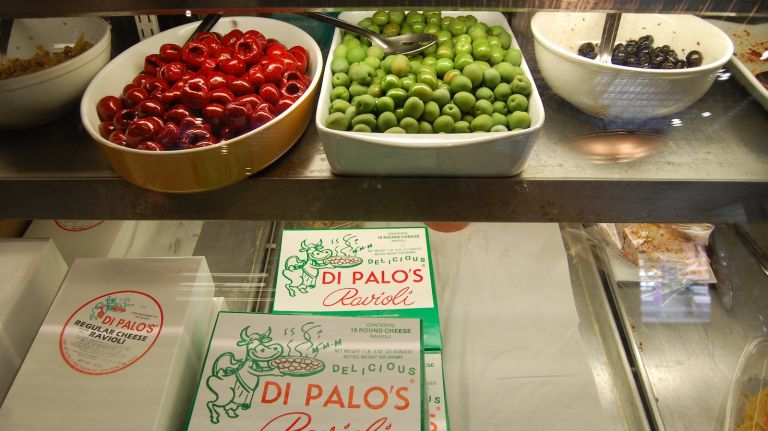 In another refrigerated case at Di Palo's: raviolis and pastas, olives and cold salads. 