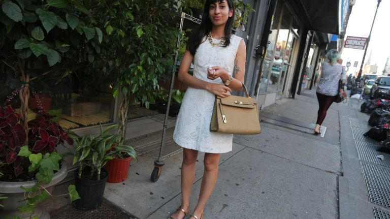 Manhattan resident Danielle Reydon, 28, accessorized an affordable, white H&M dress with a luxe Hermes bag on an especially hot September day. Her style? 