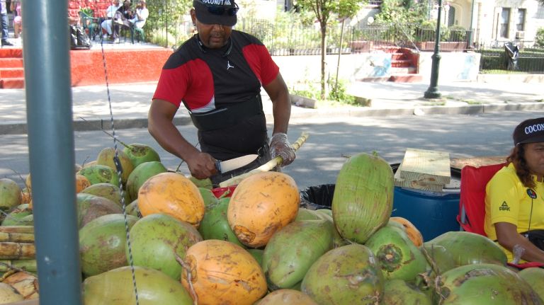 Coconuts (and fresh coconut water) are another familiar site along the parade route. 