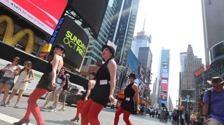 Theatre Mama performers, promote the show Chicago in Duffy Square, in the Theater District, on Tuesday, July 22 2014. 