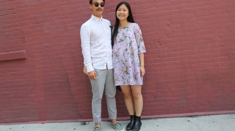 Peter Hays, 21, a graduate student at the London School of Economics, in All Saints pants and an Everlane top, and Nancy Chong, 19, a student at American University, in an American Apparel dress, stroll SoHo on July 25, 2014.