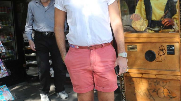 Charlie Abelman, 26, of the East Village, wears J.Crew shorts, Topshop slippers and button-down and his mom's belt. 