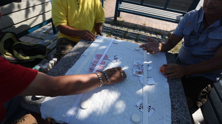 A game of Knock Rummy at the Canarsie Pier in Canarsie, Brooklyn, Friday July 11, 2014.