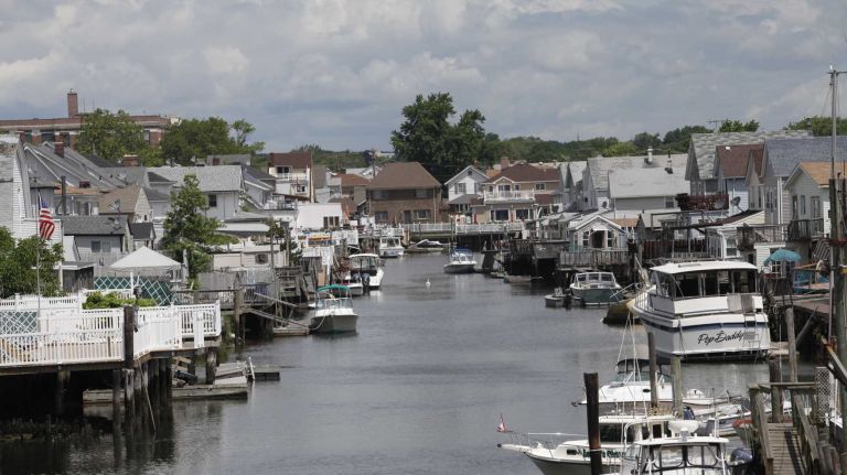 Houses along the Hawtree Basin in Howard Beach, Queens, Thursday, June 26, 2014.
