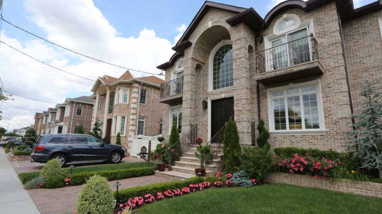 Houses along 83rd street near 165th ave. in Howard Beach, Queens, Thursday, June 26, 2014.