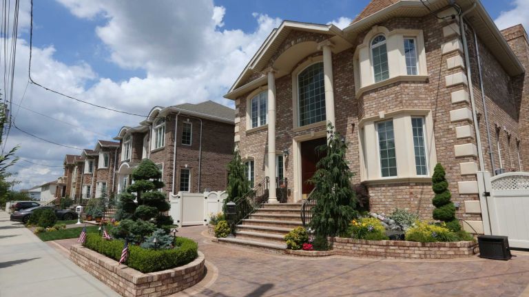 Houses along 83rd street near 165th ave. in Howard Beach, Queens, Thursday, June 26, 2014.