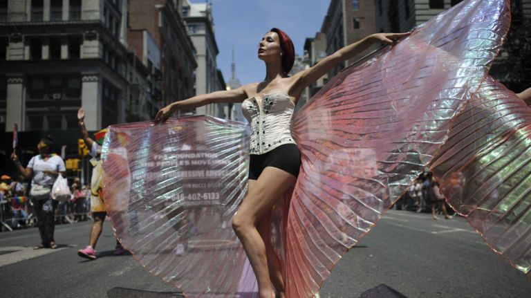 Participants walk during the New York City pride parade in Manhattan on Sunday, June 29, 2014.