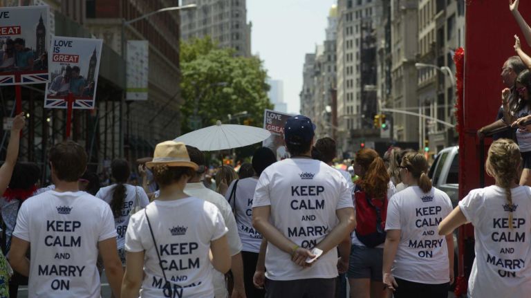 Participants walk during the New York City Pride Parade in Manhattan on Sunday, June 29, 2014.
