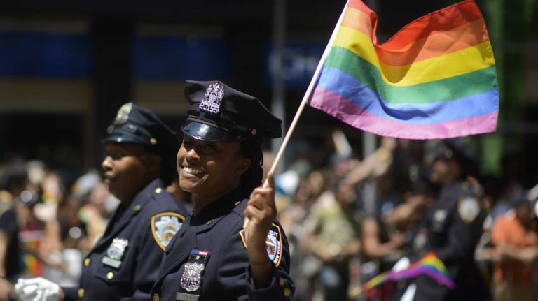 Members of the New York Police Department march during the New York City pride parade in Manhattan on Sunday, June 29, 2014.