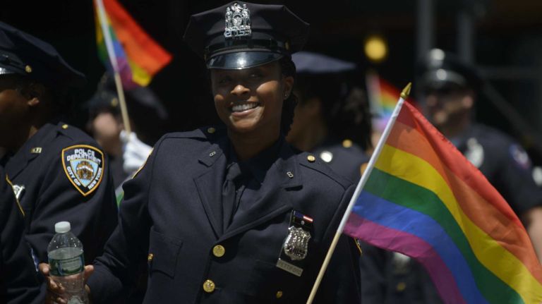 Members of the NYPD march during New York City pride parade in Manhattan on Sunday, June 29, 2014.