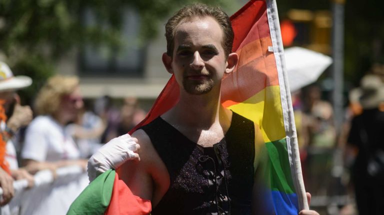 Participants walk during the New York City pride parade in Manhattan on Sunday, June 29, 2014.