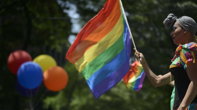Participants ride a float during the New York City pride parade in Manhattan on Sunday, June 29, 2014.