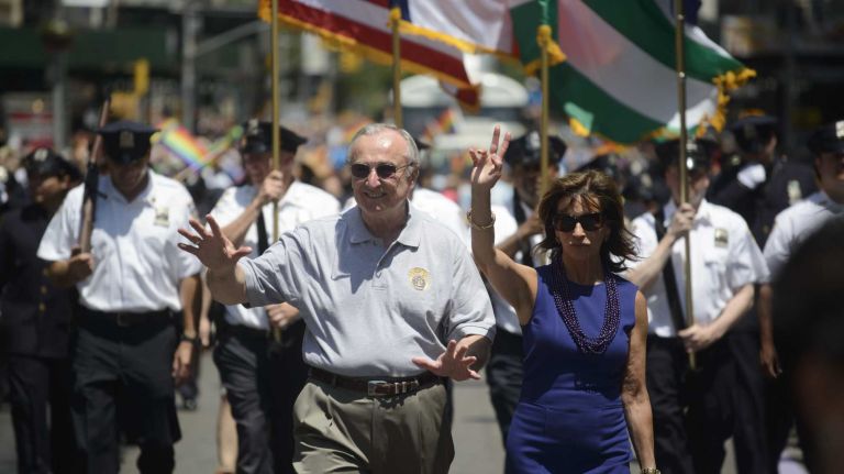 NYPD Commissioner William Bratton and his wife Rikki Klieman march at the pride parade in Manhattan on Sunday, June 29, 2014.