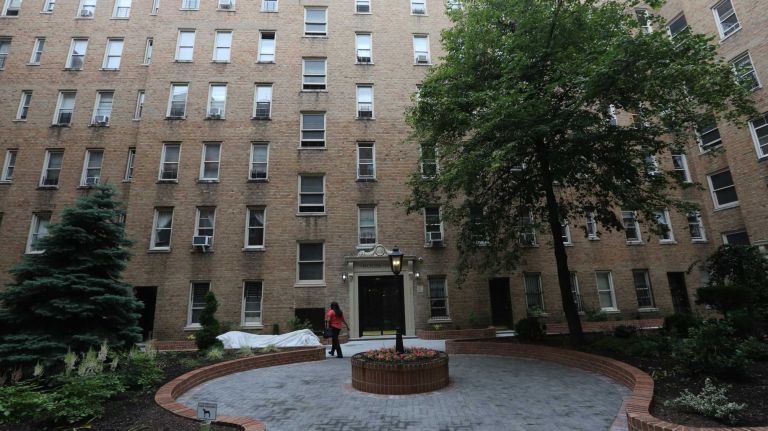 The courtyard at the Broadyke Apartments at 4761 Broadway in Inwood, Thursday, June 19, 2014. 