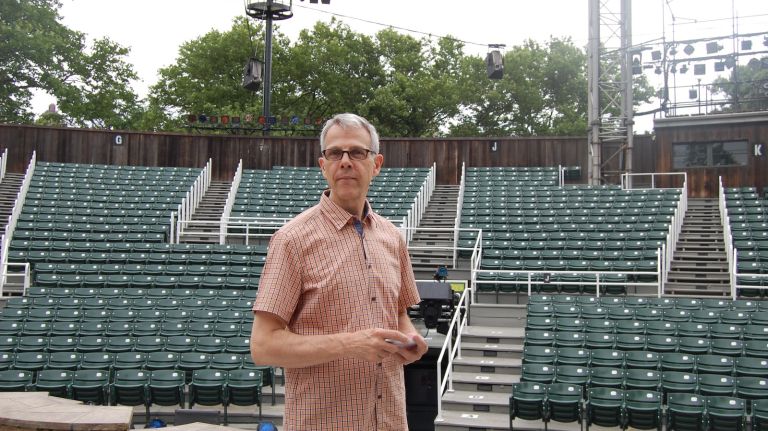 Public Theater Costume Master Luke McDonough on the stage at the Delacorte Theater in Central Park. 