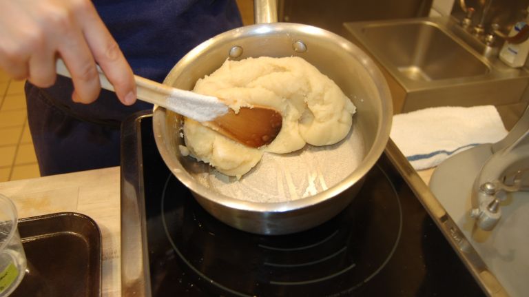Éclair recipe from Bouchon Bakery 21 Place over medium heat and stir rapidly for 1 to 2 minutes, until the dough pulls away from the sides of the pan and the bottom of the pan is clean; the dough should be glossy and smooth but not dry.