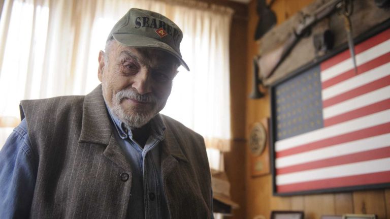 World War II 'Seabees' veteran Joseph Garofalo poses for a photograph in his Morris Park house on Thursday, June 05, 2014. Garofalo served in the Pacific theatre in the 121st N.C.B. 20th Marines, 4th Marine Division and took part in combat operations on Roi-Namur, Saipan and Tinian.