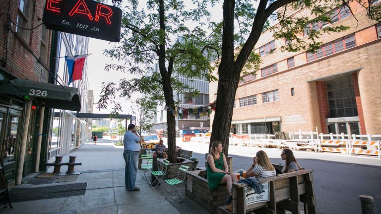 Kelsey Delmote, Tenley Allen, and Colleen Hanson grab a drink at the Earn Inn in Hudson Square in Manhattan on June, 1, 2014. 