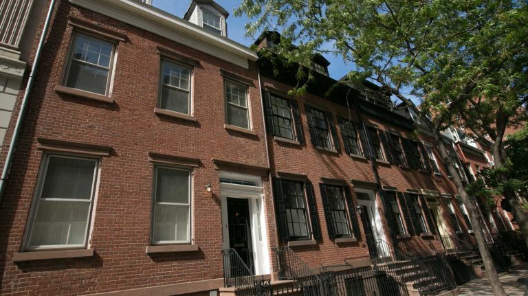 Townhouses on Vandam Street in Hudson Square in Manhattan on June, 1, 2014. 