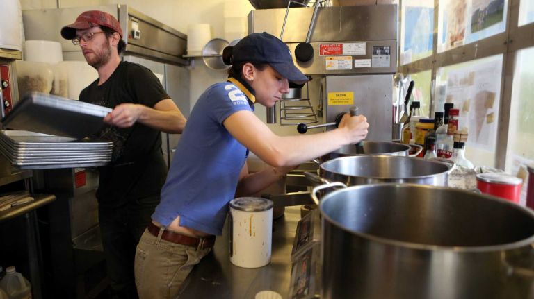 Adam Lippert and Jamie French make ice cream at Ample Hills Creamery in Prospect Heights, Brooklyn, Wednesday, May 7, 2014. Ample Hills makes their ice cream in house and will be opening a new store in Gowanus in June.