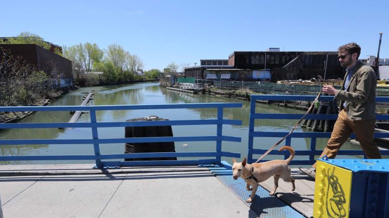 Crossing the Carroll Street bridge in the Gowanus, Brooklyn, Monday, May 5, 2014. Gowanus is a a neighborhood in transition.
