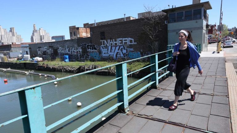 Crossing the Union Street bridge over the Gowanus Canal in Gowanus, Brooklyn, Monday, May 5, 2014. Gowanus is a a neighborhood in transition.