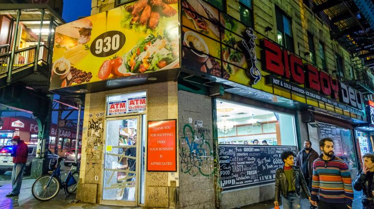 NYPD officers investigate Big Boy Deli in connection with victims at Broadway and Myrtle Avenue believed to be sickened after smoking K2 on Saturday.