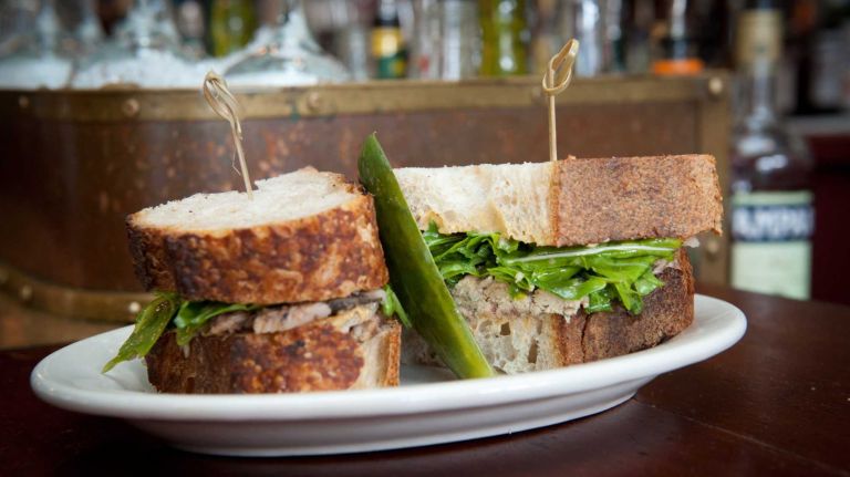 Sardines: the cool new fish swimming onto NYC menus 6 Fresh sardines are healthier since they're not packed in oil, but we couldn't resist including this sandwich, which uses the tinned variety. The sardines, a saffron-packed rouille sauce and peppery arugula are layered between two thick pieces of She Wolf Bakery sourdough. Don't forget the pickle! $12; 180 West St. in Greenpoint, 347-987-3666.