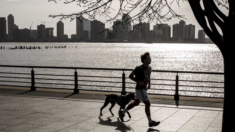Photos of the Far West Village 18 A man runs on the Hudson River Greenway in the West Village in Manhattan on April 14, 2014.