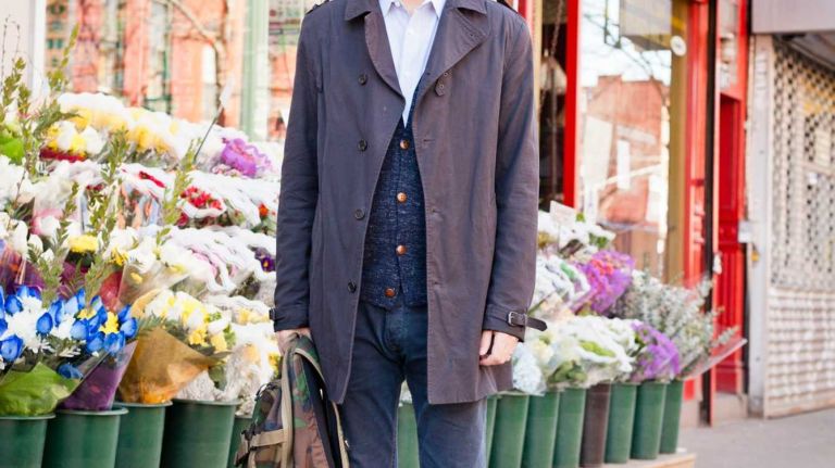 Gregg Martinez, of the Financial District, accents his ensemble (Diesel jeans, All Saints Jacket, J.Crew sweater, Theory shirt) with a cool camouflage-print backpack from Nike. 