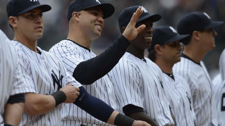 Carlos Beltran, second from left, during the opening ceremonies of the Yankees' home opener against the Baltimore Orioles at Yankee Stadium on April 7, 2014.