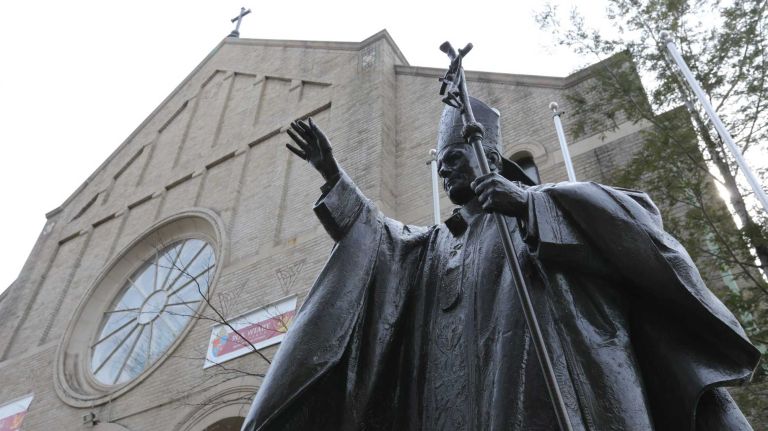 A statue of Pope John Paul II outside of St. Frances de Chantel Roman Catholic Church at 1273 58th street in Borough Park, Brooklyn, Sunday, Mar. 16, 2014. Borough Park is a predominately Orthodox Jewish neighborhood in central, Brooklyn.